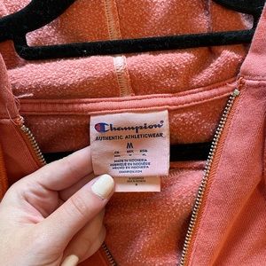 Champion orange colored cropped sweatshirt